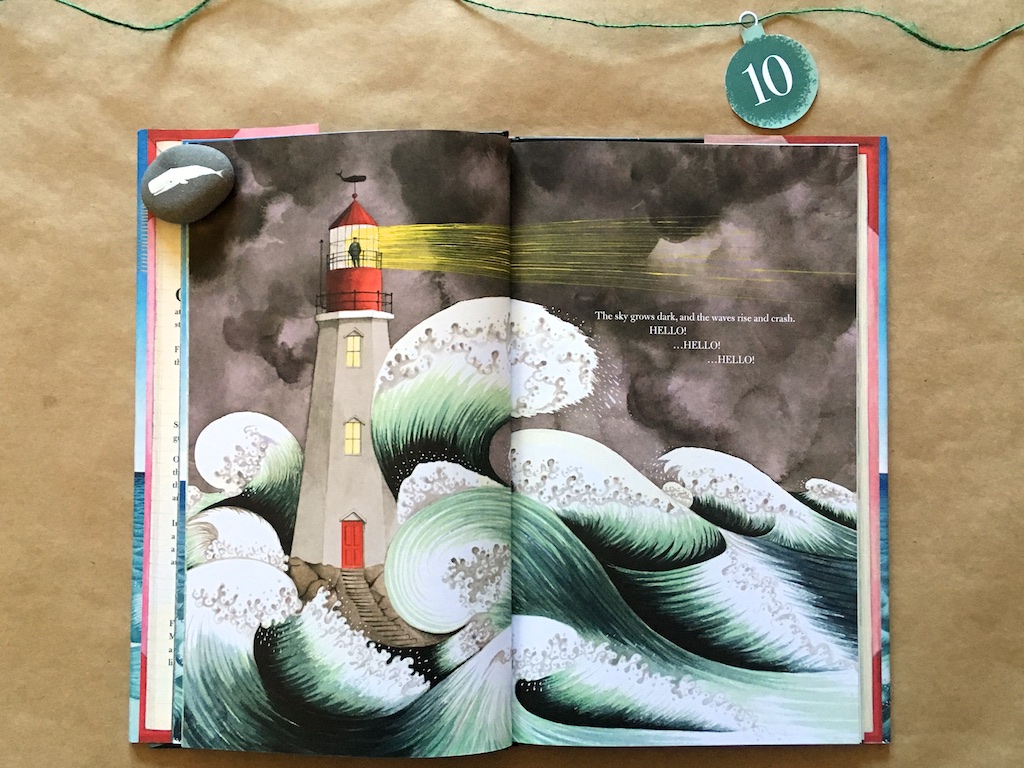 The lighthouse is in a very wave-filled storm, the man stands at the top with the light shining brightly.