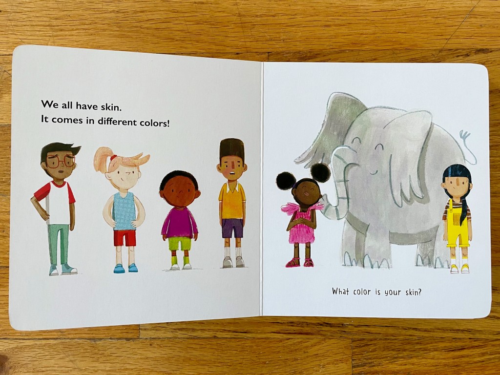 White page with six children of various heights, sizes, races, and clothing styles. Also, there is a large elephant tenderly smooching a black girl's cheek with its trunk.