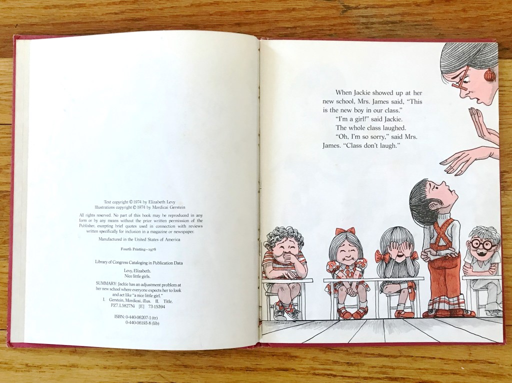 The teacher is leaning over Jackie looking upset that she made a mistake. Kids at desks giggle in the background.