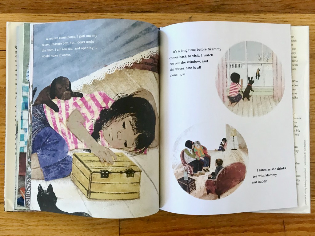 On the left page, the little girl lays on the floor next to her bed with one hand on the yellow box. Her dog peeks over top of her. On the right page, one circular vignette shows the little girl and dog peering at the window and waving to her grammy who is walking to their house. The second vignette shows the grammy sitting on a sofa with the mom while the dad sits nearby. The little girl is sitting on the floor in the background.
